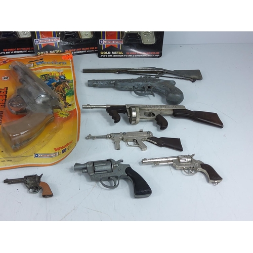 42 - Various toy guns and spud guns