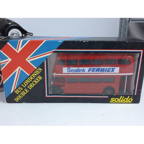 50 - Boxed vintage model vehicles