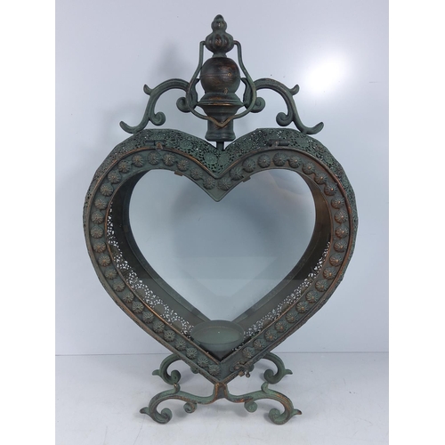 98 - Heart shaped metal and glass lantern, 53cms in height