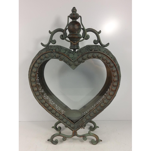 99 - Heart shaped metal and glass lantern, 53cms in height