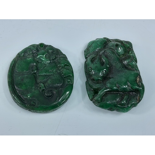 207 - 2 jade green amulets