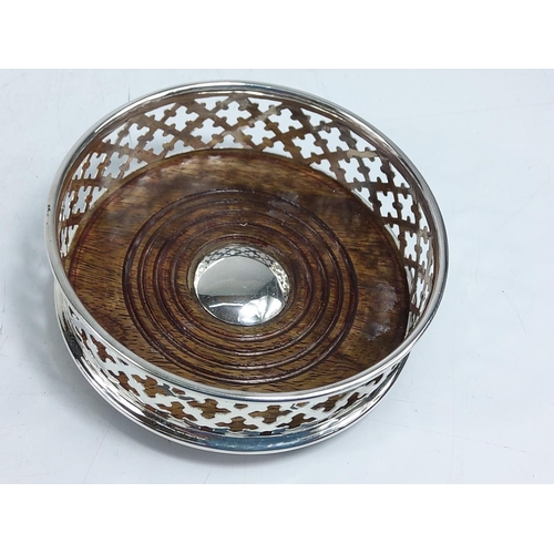 236 - Wood and metal wine coaster, 13cms in diameter