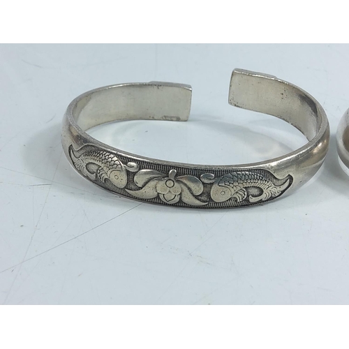 204 - 2 white metal bangles