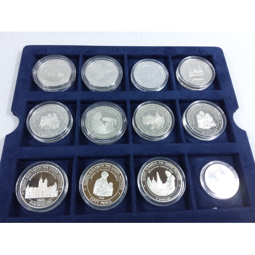 257 - Cased set of 35 commemorative silver proof coins plus one proof silver commemorative coin