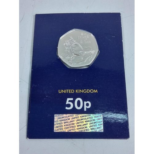 259 - 12 various cased proof 50p pieces