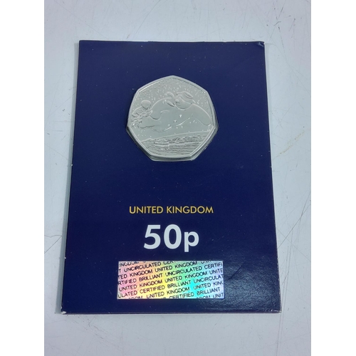 259 - 12 various cased proof 50p pieces