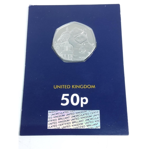 259 - 12 various cased proof 50p pieces