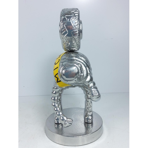 131 - Cast aluminium Michelin man figure, 30cms in height