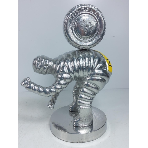 131 - Cast aluminium Michelin man figure, 30cms in height