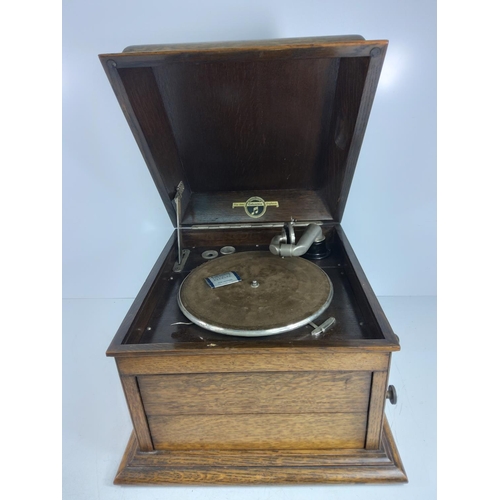 137 - Oak cased Columbia Gramophone with louver front