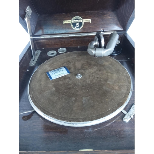 137 - Oak cased Columbia Gramophone with louver front