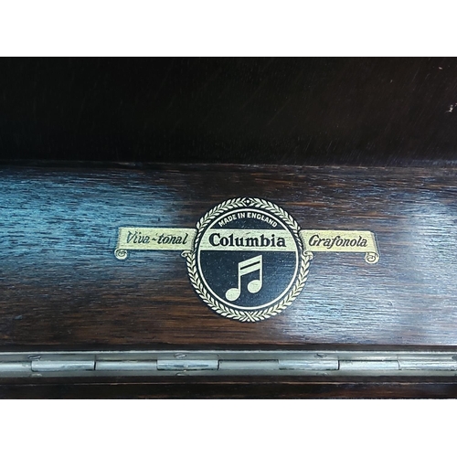 137 - Oak cased Columbia Gramophone with louver front