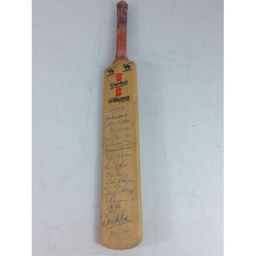 25 - MB utility golf club and a miniature cricket bat signed by the Yorkshire Cricket Team.  Geoffrey Boy... 