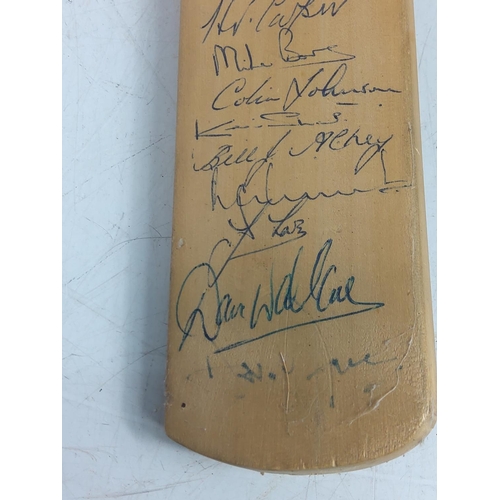 25 - MB utility golf club and a miniature cricket bat signed by the Yorkshire Cricket Team.  Geoffrey Boy... 