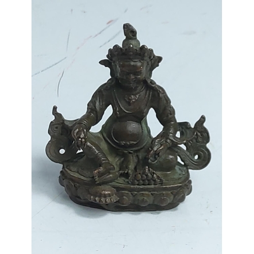 260 - Cast bronze oriental Goddess figure, 6cms in height