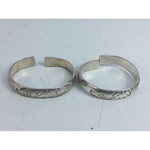 269 - 2 white metal bangles