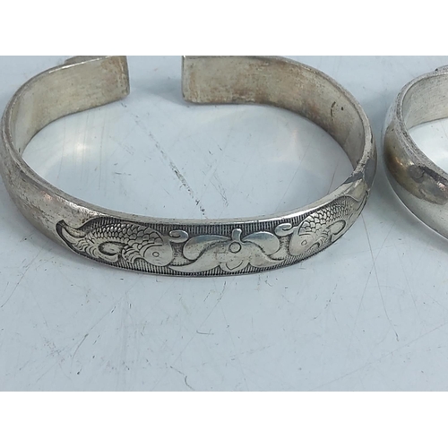 269 - 2 white metal bangles