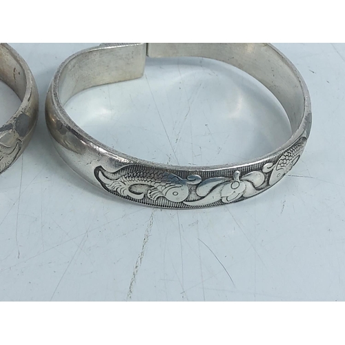 269 - 2 white metal bangles