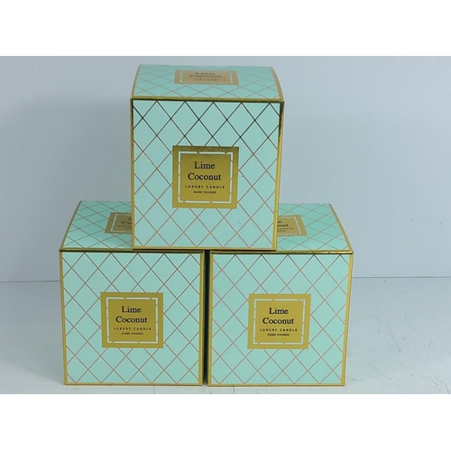 141 - 3 boxed lime and coconut candles