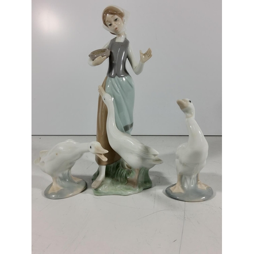 158 - Lladro lady with goose and 2 other geese
(Lady: 24cm tall)