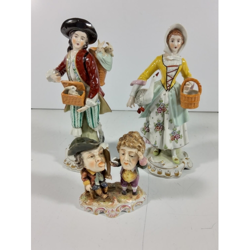 159 - German porcelain caricature figure of 2 men & pair of Porcelain figures