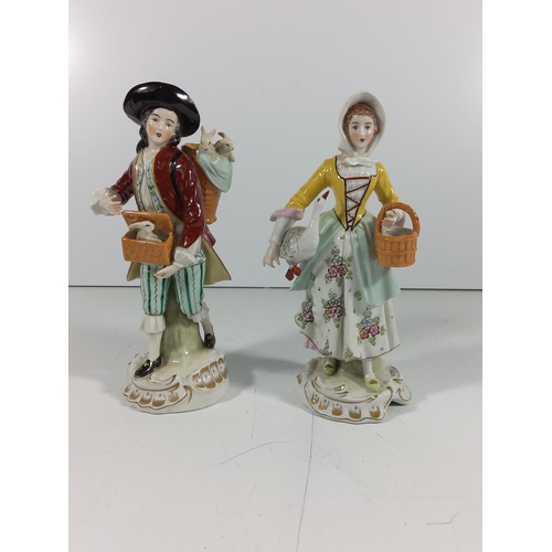 159 - German porcelain caricature figure of 2 men & pair of Porcelain figures
(Gent and Lady: 19.5cm tall)... 