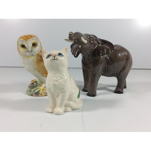 161 - 3 Beswick figures, Cat, Elephant & Owl
(Owl: 12cm tall)
(Cat: 10cm tall)
(Elephant: 12cm tall)