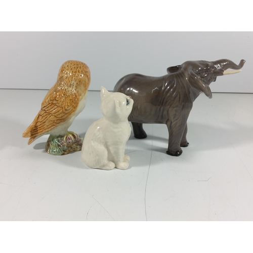 161 - 3 Beswick figures, Cat, Elephant & Owl
(Owl: 12cm tall)
(Cat: 10cm tall)
(Elephant: 12cm tall)