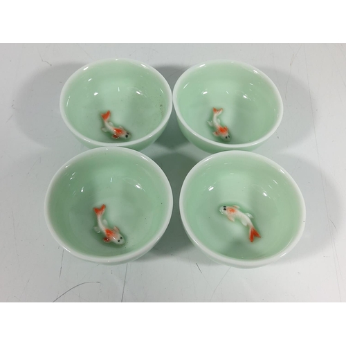 171 - 4 Porcelain dishes with swimming koy