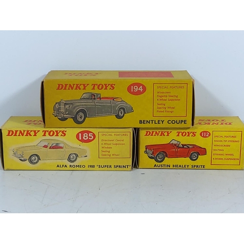 36 - 3 Boxed Dinky toys 194,185,112