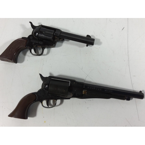 65 - two miniature replica pistols