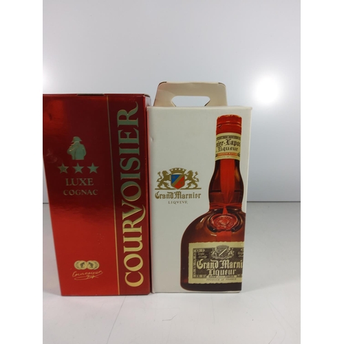 79 - Boxed bottle of Luxe Cognac Courvoisier & Boxed bottle of Grand marnier