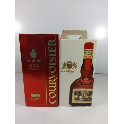 79 - Boxed bottle of Luxe Cognac Courvoisier & Boxed bottle of Grand marnier