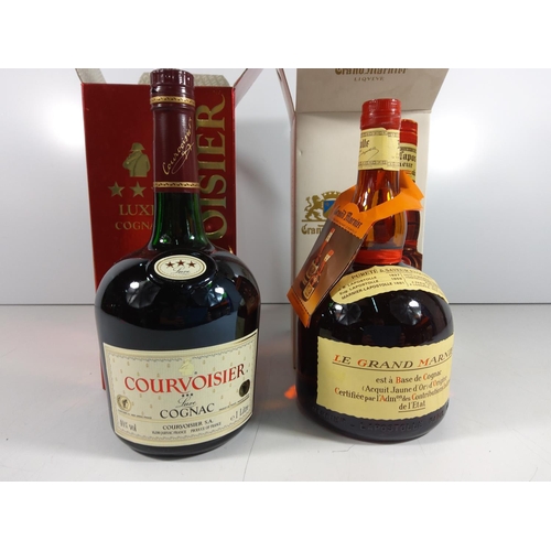 79 - Boxed bottle of Luxe Cognac Courvoisier & Boxed bottle of Grand marnier