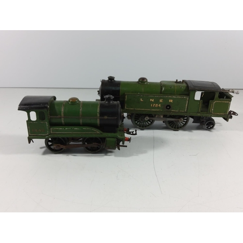 135 - 2 vintage clockwork engines