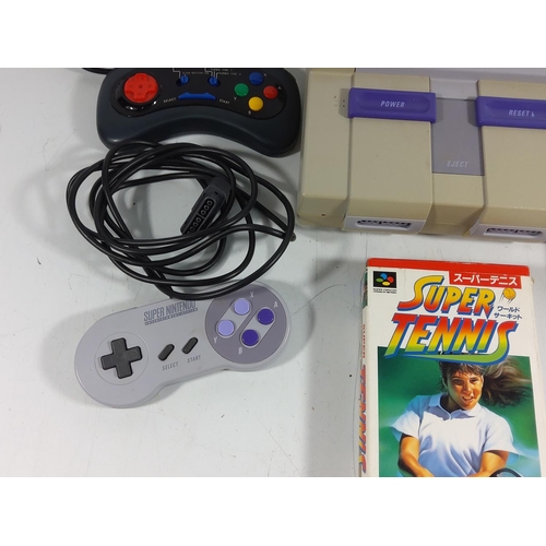 139 - Super Nintendo console with games and controllers