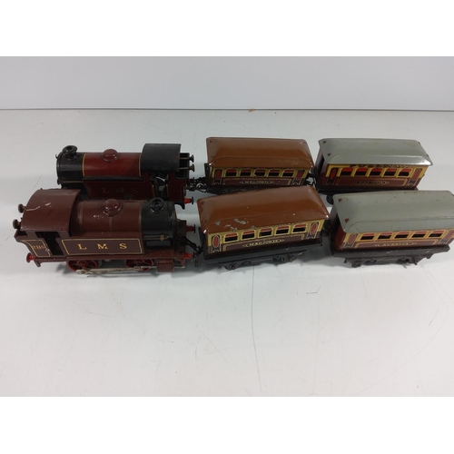 72 - 2 Clockwork engines and 4 carriages  - all hornby