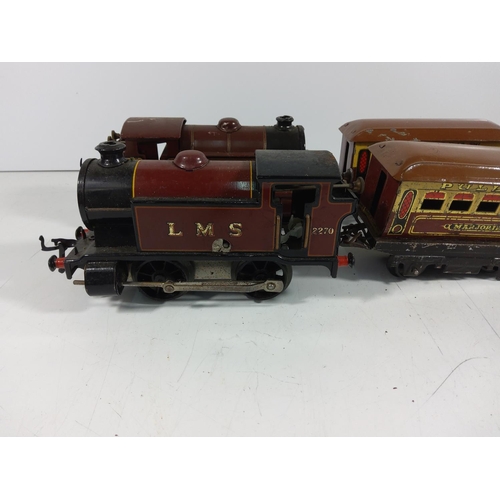 72 - 2 Clockwork engines and 4 carriages  - all hornby