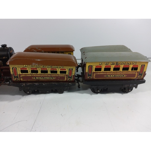 72 - 2 Clockwork engines and 4 carriages  - all hornby