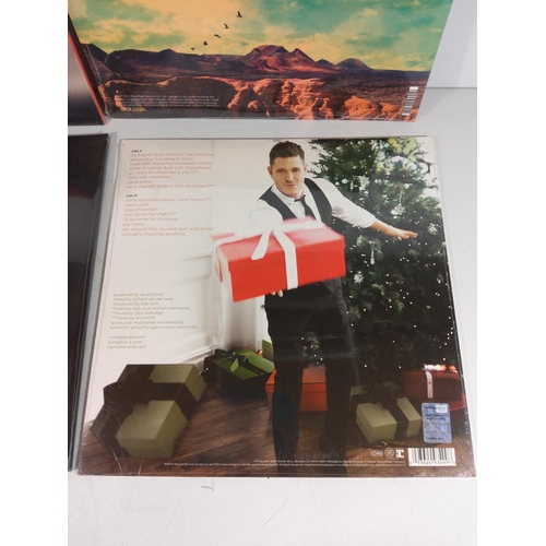 245 - Selection of vinyl incl new and sealed by Bowie and Noel Gallagher