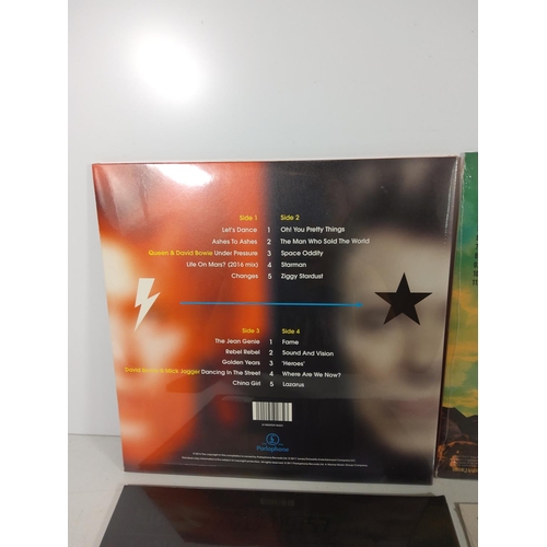 245 - Selection of vinyl incl new and sealed by Bowie and Noel Gallagher