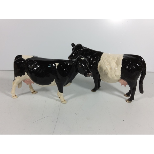 354 - 2 Beswick cows