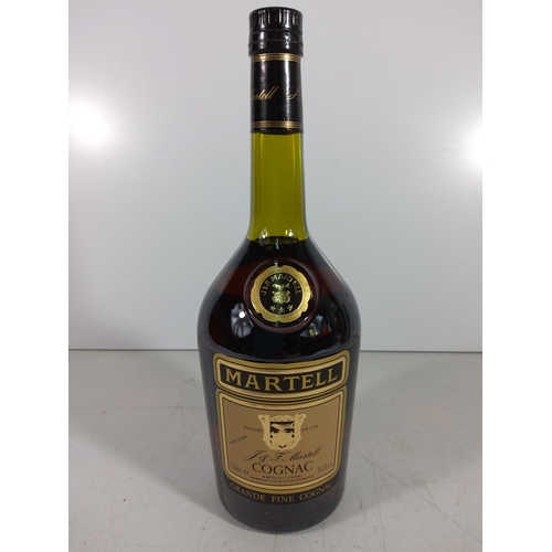 320 - Bottle of martell brandy