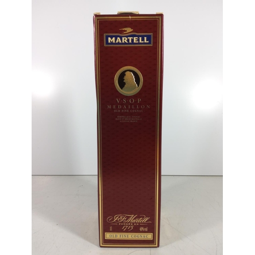 323 - Bottle of Martell brandy