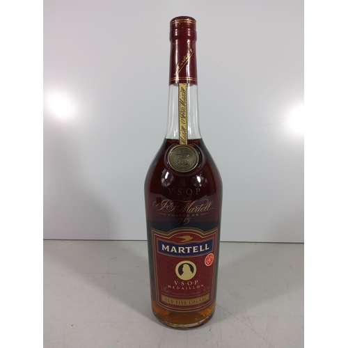 323 - Bottle of Martell brandy