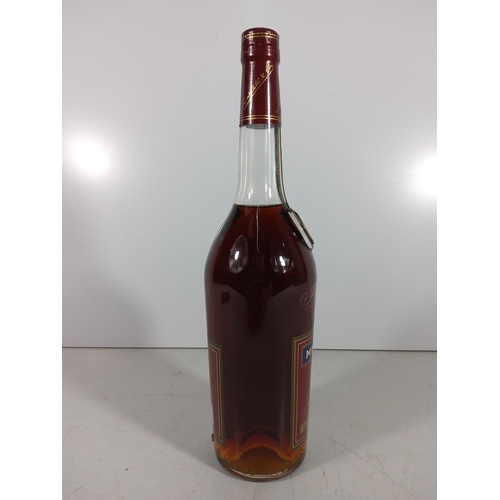 323 - Bottle of Martell brandy