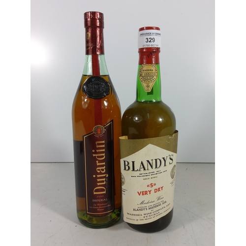 329 - Bottle of gin and bottle of brandy