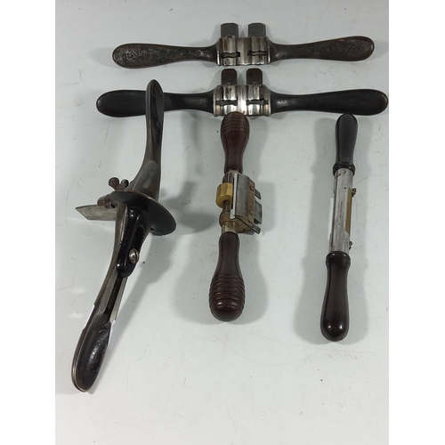 404 - 5 various antique spoke shaves