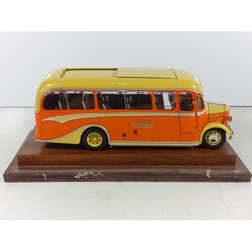 281 - Large cased bedford coach