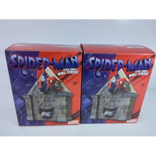 105 - 2 Spiderman clock tower wall statues